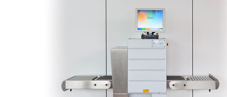 A computer monitor sitting on top of a desk.