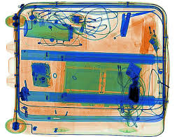 A picture of an old suitcase with some blue and green lines.